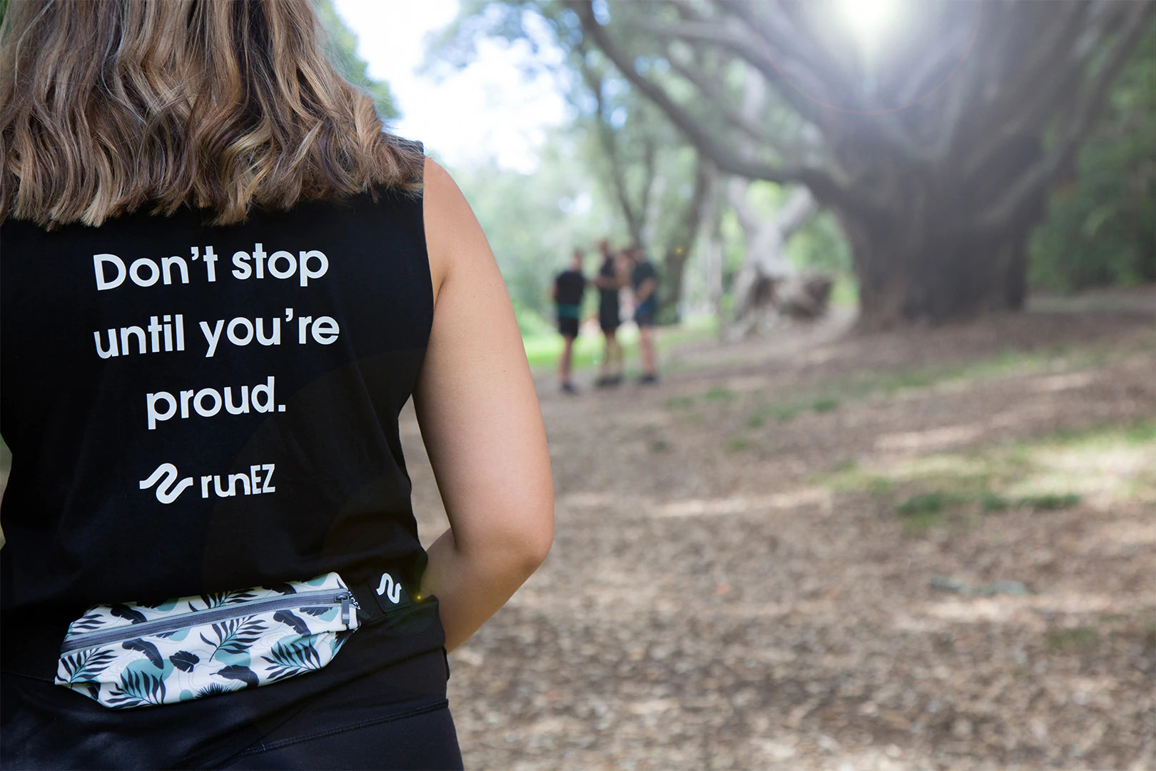 person wearing running belt hip bag to carry phone